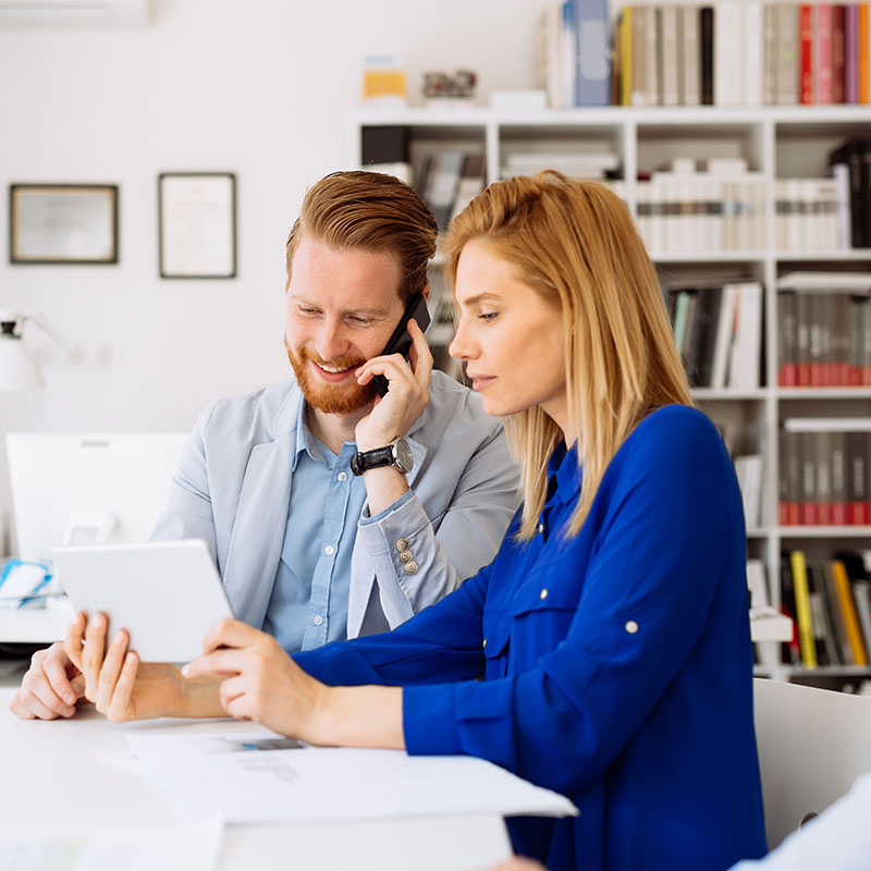 Business people working in office and brainstorming